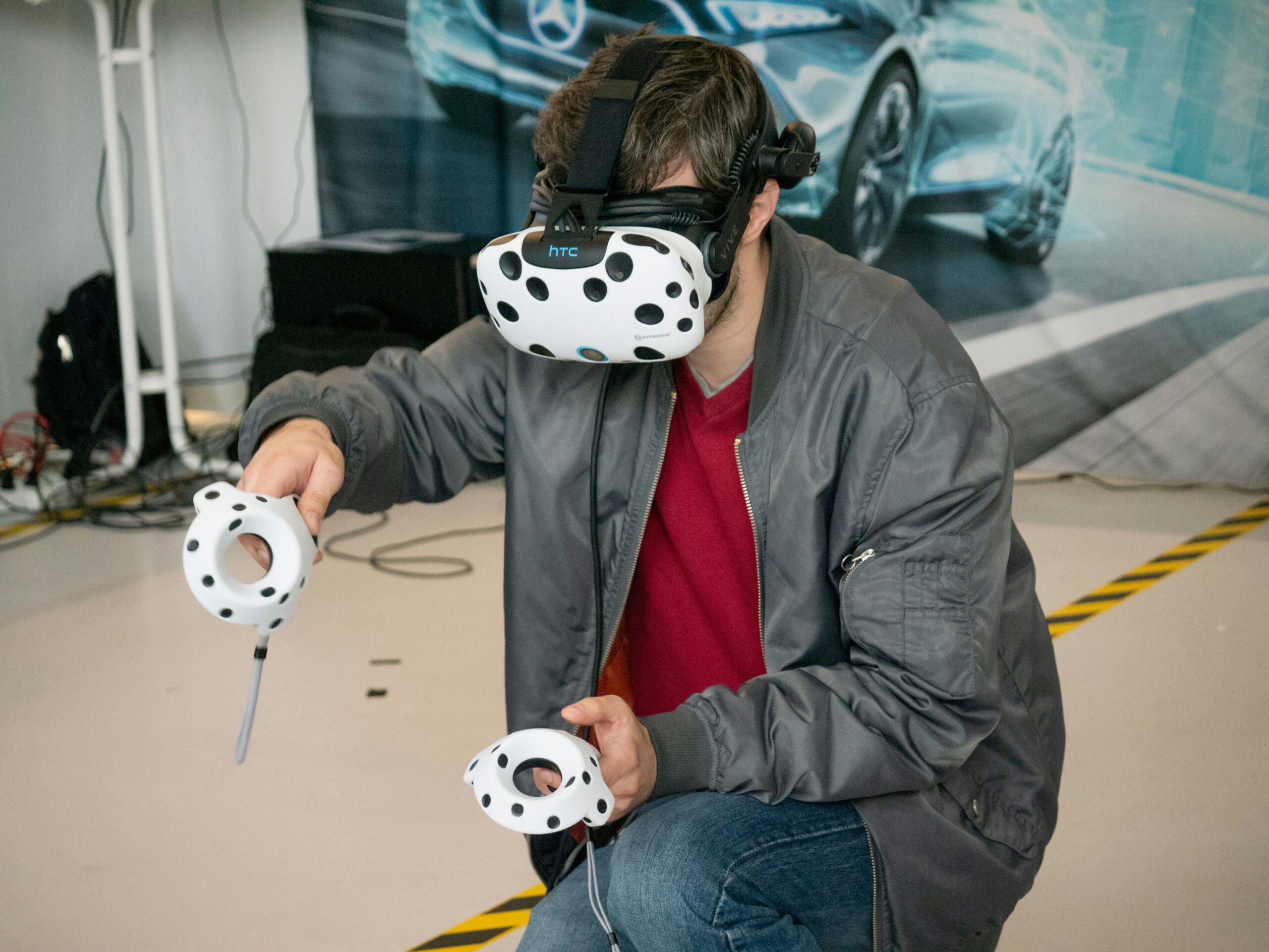 An individual immersed in virtual reality with a headset on is engaging in a virtual career simulation.