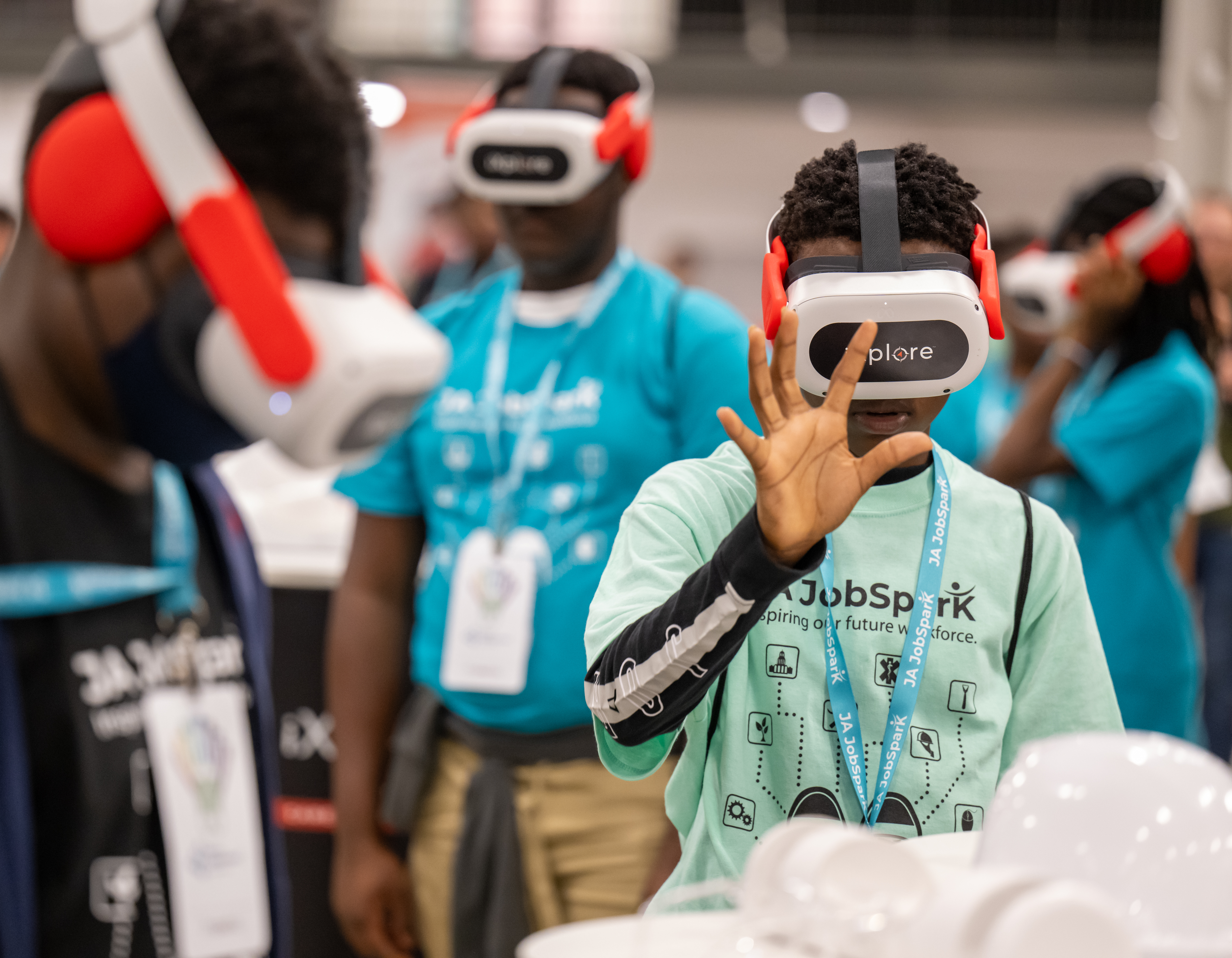 Student wearing VR headset engaging in career exploration environment.