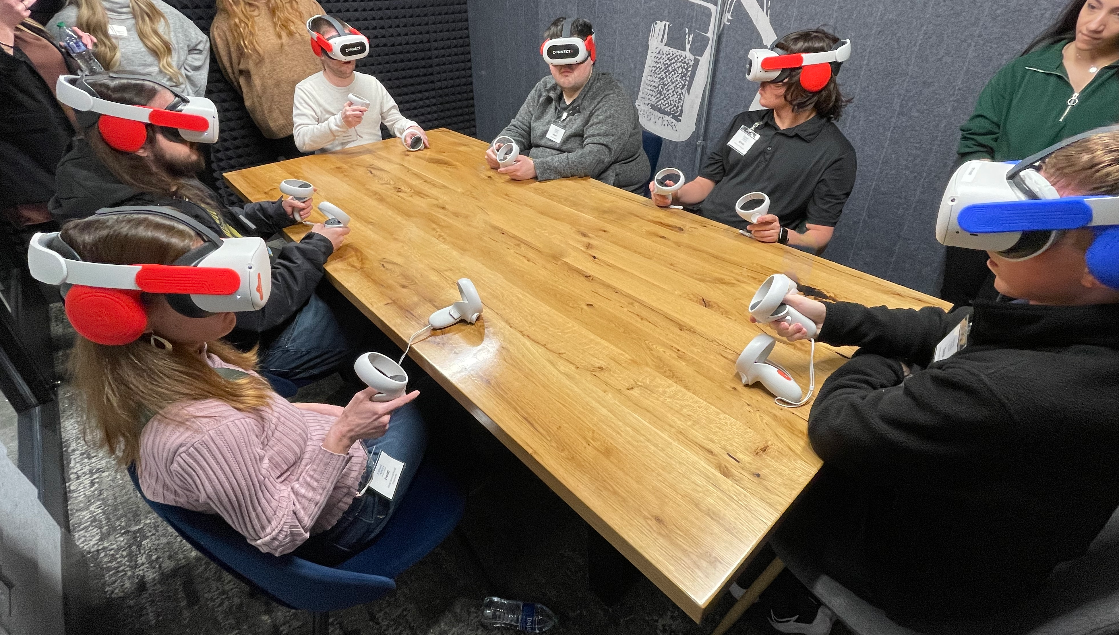 Student wearing VR headset engaging in career exploration environment.